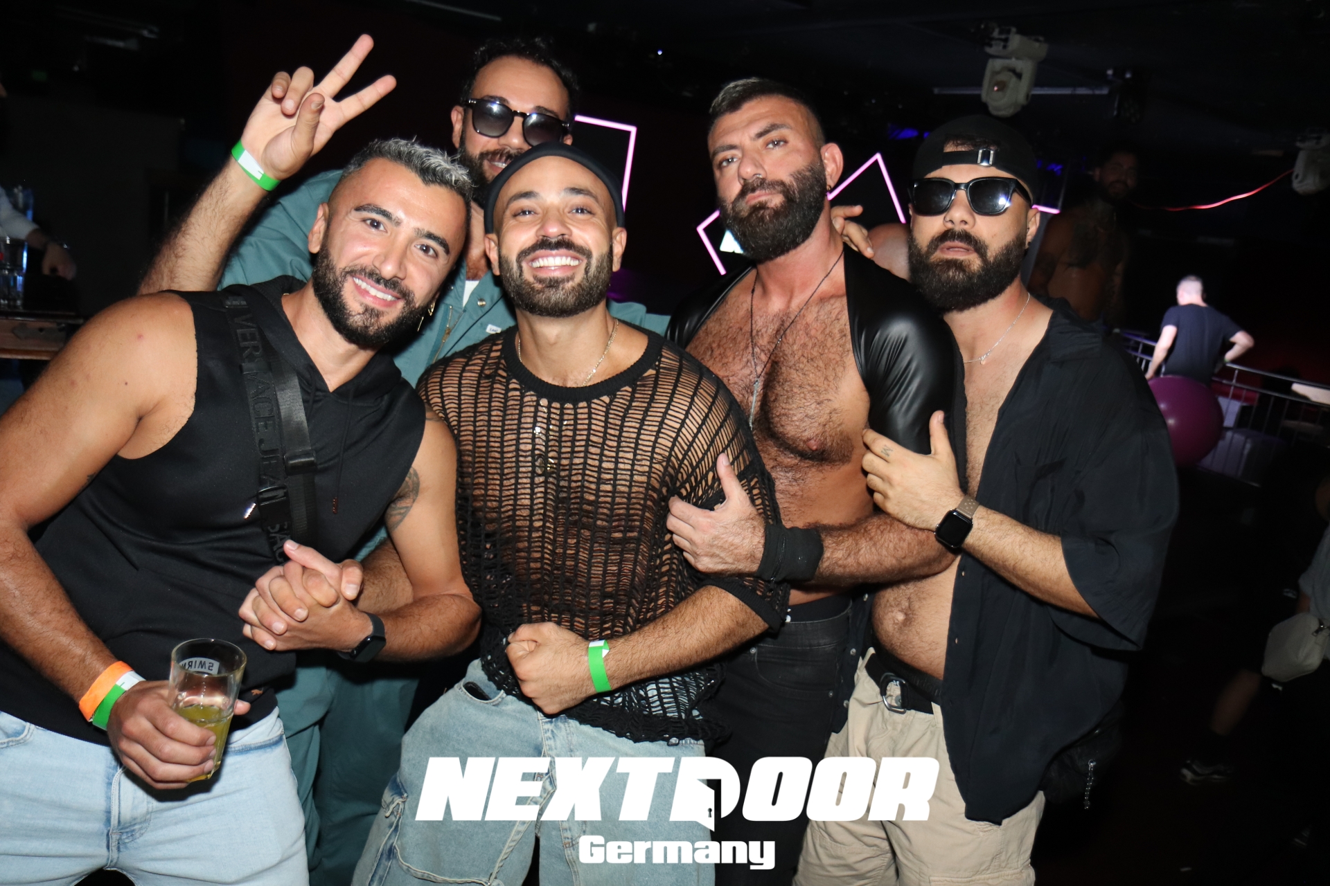 Gay party Köln crowd energy at NEXTDOOR queer club night with lasers